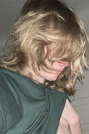 NSA with a Long Beach long blond haired surfer with a big pole