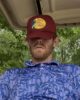 Kannapolis nudist golfer showing his club and balls